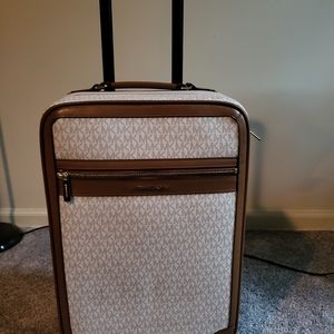 Michael Kors rolling carryon
